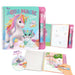 Unicorn-themed coloring book with pen and open book showing illustrations on a white background