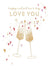 Two gold champagne glasses with hearts and 'Happy Valentine's Day Love You' text on a white background