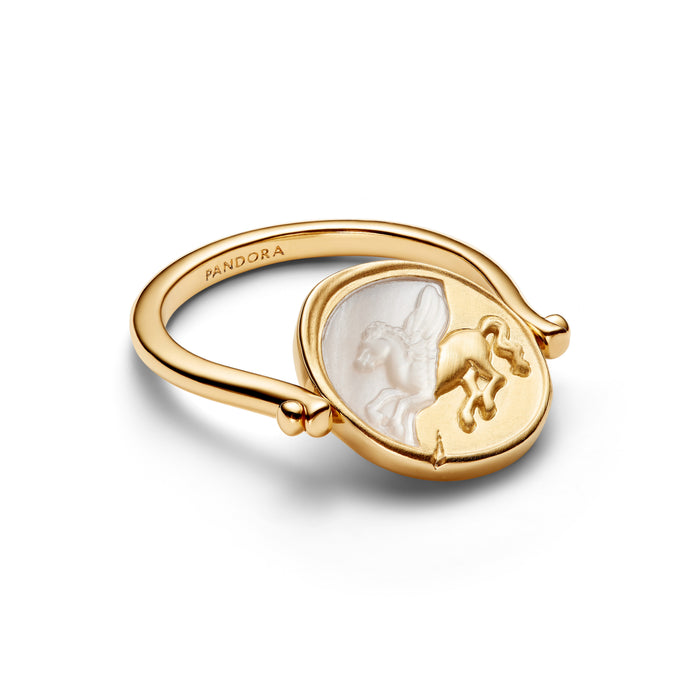 A gold signet ring by Pandora featuring a white mother-of-pearl winged horse relief on a white background.