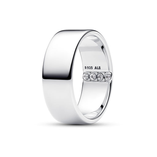 A polished silver band ring with a row of four small clear gemstones on the inner band, shown on a white background. The inside of the ring is engraved with 'S925 ALE'.