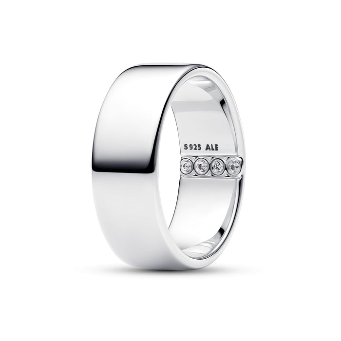 A polished silver band ring with a row of four small clear gemstones on the inner band, shown on a white background. The inside of the ring is engraved with 'S925 ALE'.