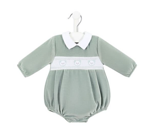 A baby footed one-piece jumpsuit in sage green with a white collar and a white horizontal band across the chest featuring three embroidered bear faces, shown hanging on a white hanger against a white background.