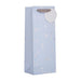 A light blue gift bag with scattered silver foil dots and a silver handle, shown on a plain white background.