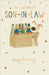 A birthday card for a son-in-law featuring a cartoon dog character next to a beer carrier labeled 'CHEERS' with colorful bottles, on a cream background with star and script text reading 'For a brilliant SON-IN-LAW Happy Birthday!'.