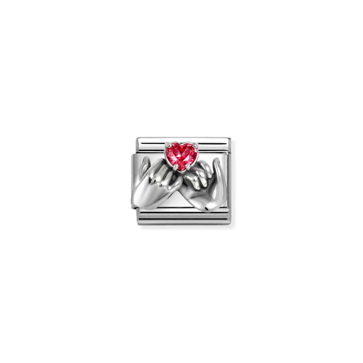 A silver-toned rectangular charm featuring two sculpted hands holding a small red heart-shaped gemstone, centered on a plain white background.