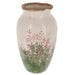 Ceramic vase with floral design on a white background