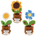 Three crocheted flower pot characters on a plain white background. Each has a small brown crocheted pot with a card that says 'Mum.