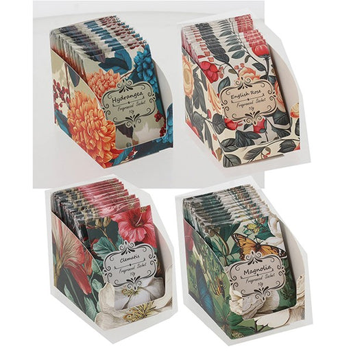 Four display stands holding small packets of botanical tea, each packet featuring a different floral and butterfly illustration. The stands are arranged on a white background.