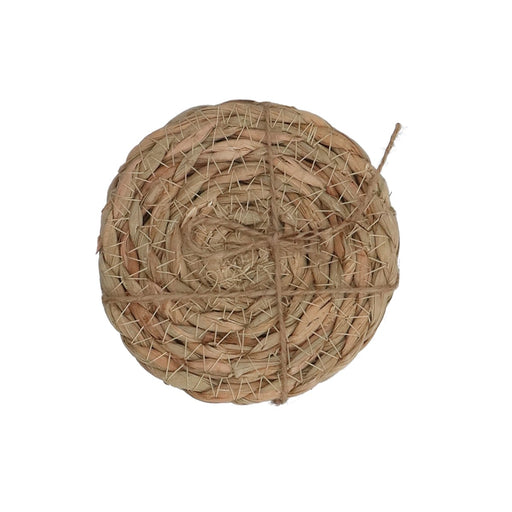 A round woven mat made from natural straw or seagrass fibers, bound in the center with twine, shown on a plain white background.
