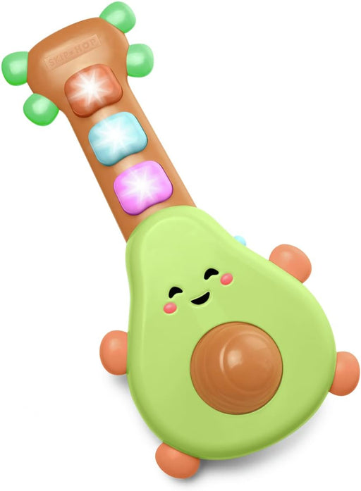 A colorful avocado-shaped baby toy guitar with a smiling face, featuring a light green body, brown neck, and four colorful button panels on the neck.