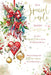 Christmas card for a special couple with festive decorations and text.
