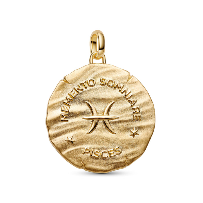 A round gold pendant charm featuring the Pisces zodiac symbol, with the words 'MEMENTO SOMNIARE' and 'PISCES' engraved on a clean white background.