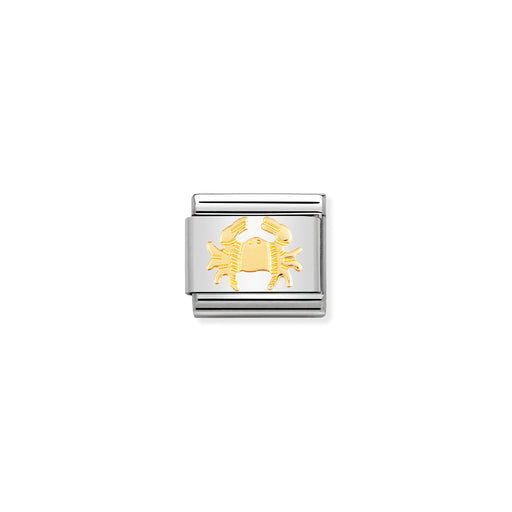 Silver and gold crab charm on a white background