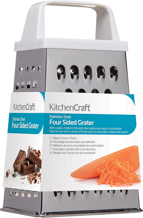 KitchenCraft four-sided stainless steel box grater with a white handle and a printed product label, shown on a plain white background.