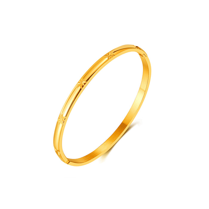 White Leaf Engraved Star Detail Bangle In Gold