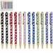 Nine decorative ballpoint pens with gold-toned tips and clips are lined up horizontally on a white background. Each pen features a white geometric pattern over a different body color: black, red, burgundy, light pink, royal blue, sage green, medium blue, and purple.
