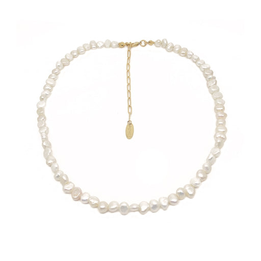 A baroque pearl necklace with a gold chain extender and a small oval gold tag, displayed on a clean white background.
