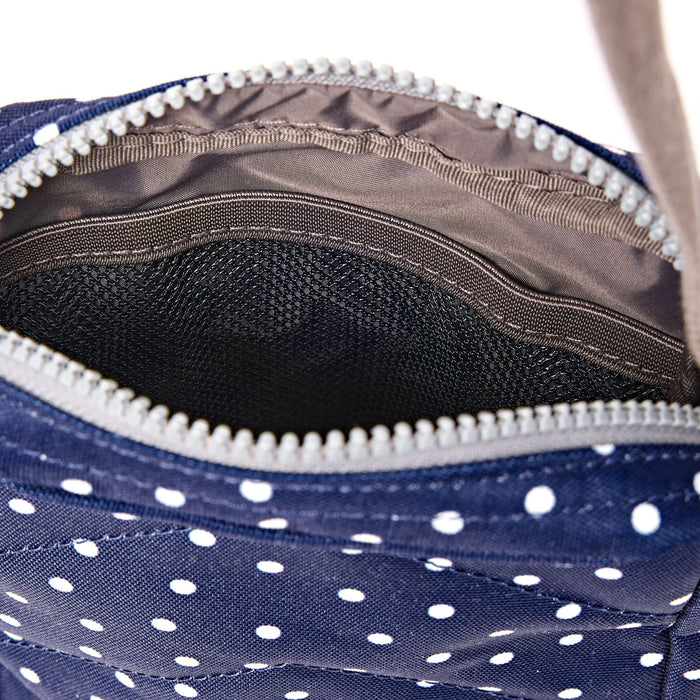 ROKA Bond Pocket Crossbody Bag in Navy Polka Dot