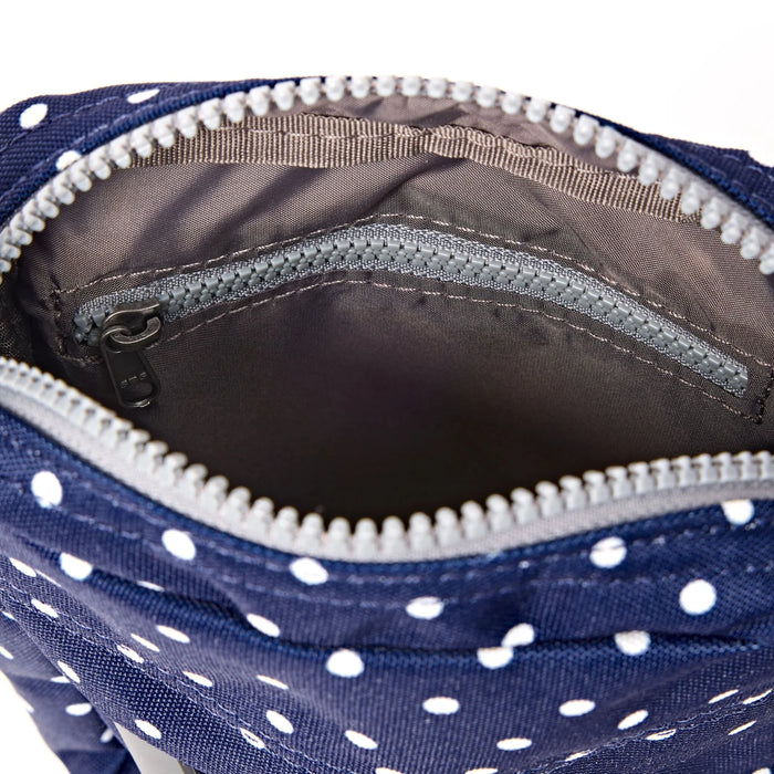ROKA Bond Pocket Crossbody Bag in Navy Polka Dot