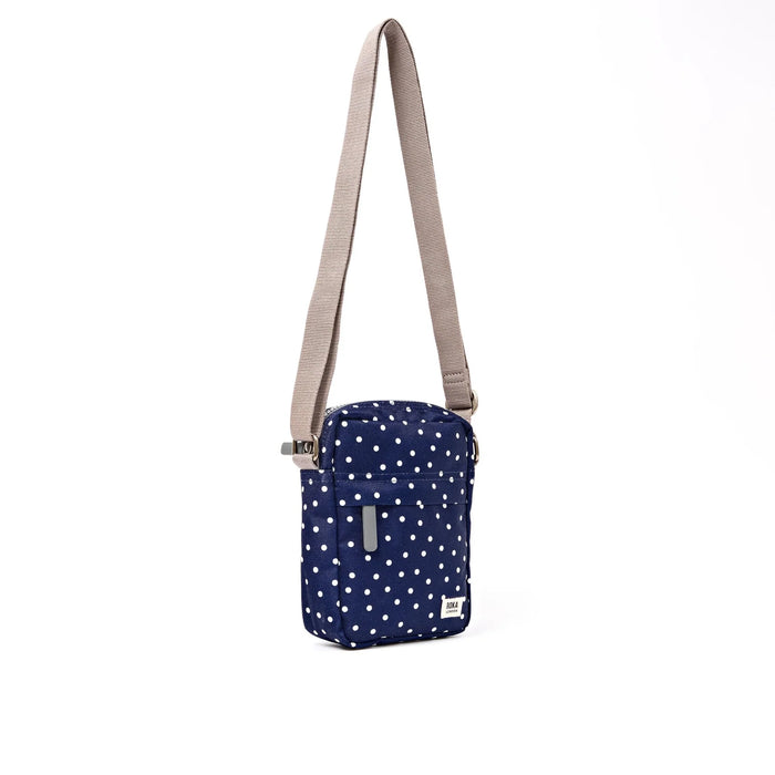 ROKA Bond Pocket Crossbody Bag in Navy Polka Dot