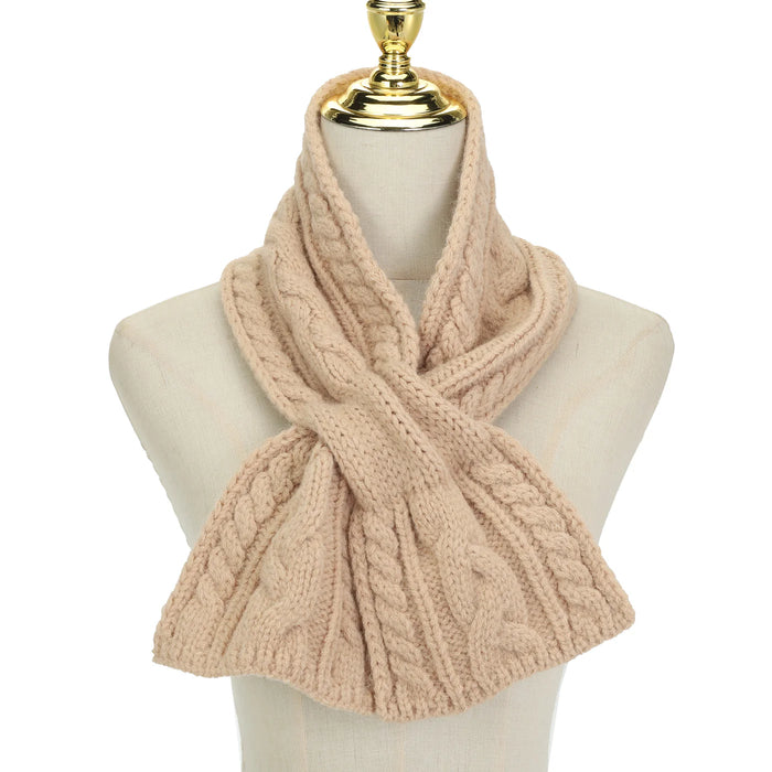Beige knitted scarf on a mannequin with a white background