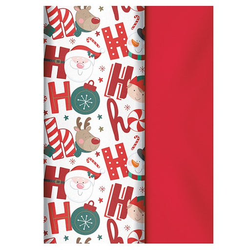 A roll of Christmas-themed wrapping paper shown partially unrolled, with a white base printed with red 'HO HO HO' letters, candy canes, Santa Claus, reindeer, snowman, ornaments, and small red stars, alongside a solid red sheet of the same paper.