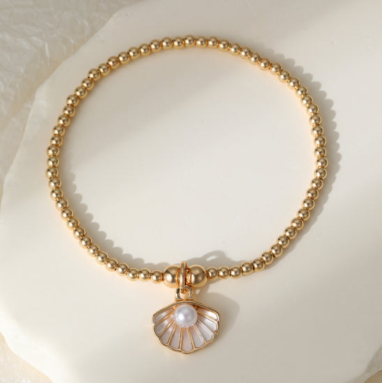Gracee Jewellery Gold Stretch Bracelet With Pearl in Shell