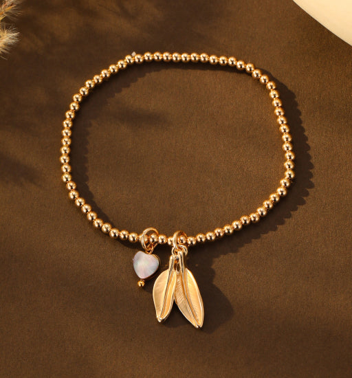 Gracee Jewellery Gold Stretch Bracelet With Heart and Feathers