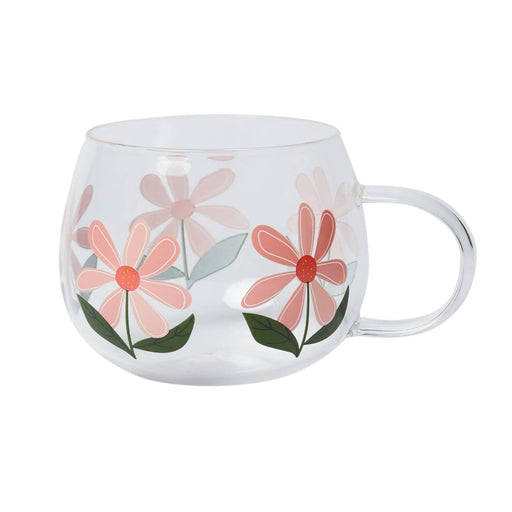 Clear glass mug with floral designs on a white background