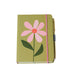 Notebook with a pink flower design on a green background