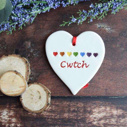 Broadlands Pottery Cwtch With Rainbow Hearts Small Hanging Heart