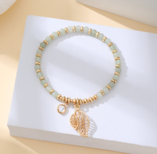 Gracee Jewellery White Beaded Gold Leaf Pendant Bracelet