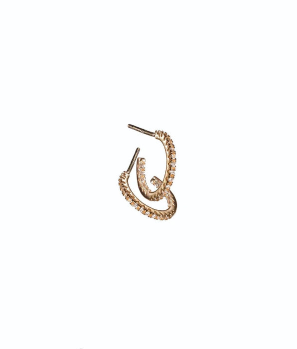 Gold hoop earring on a white background with 'fine & delicate' text.