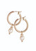 A pair of gold hoop earrings with a dangling white pearl bead, shown against a plain white background.