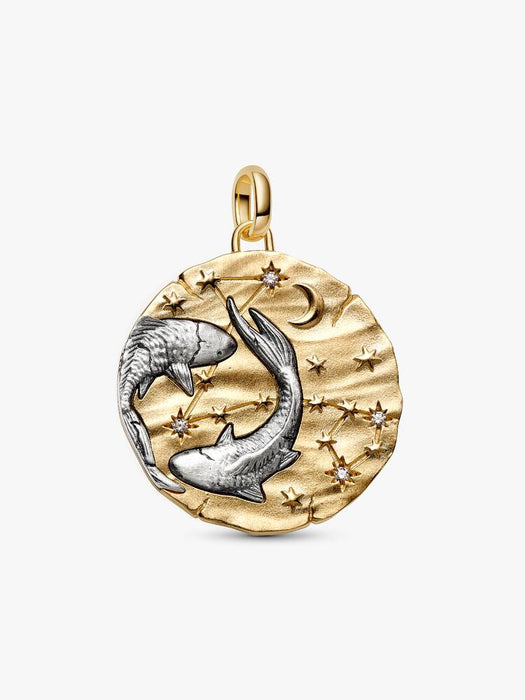A gold and silver Pisces zodiac pendant featuring two fish, a crescent moon, and stars, displayed on a light gray background.