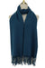 Navy blue scarf with fringes on a mannequin against a white background