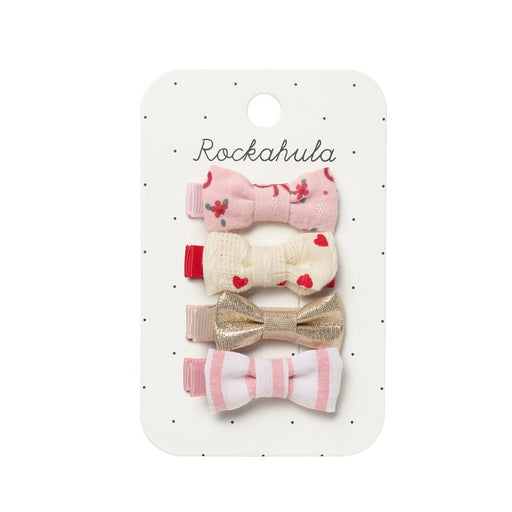 Set of four hair bows on a Rockahula branded card