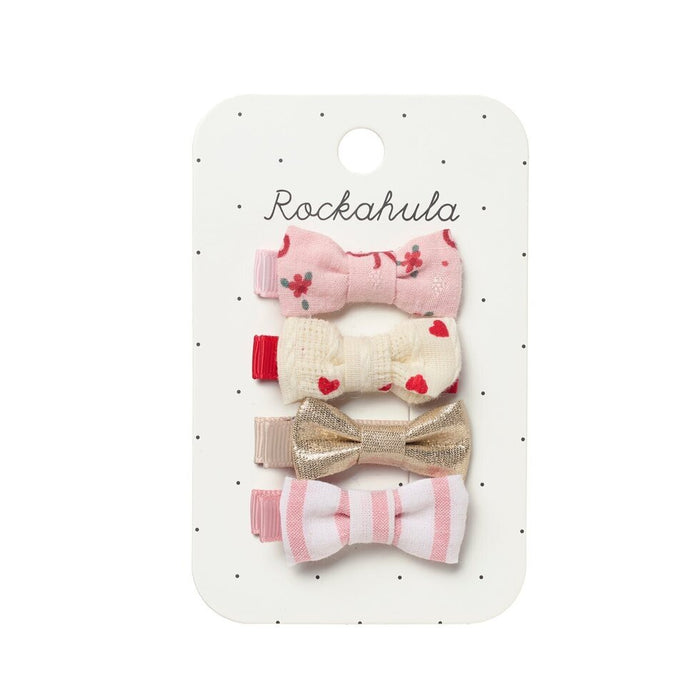 Set of four hair bows on a Rockahula branded card