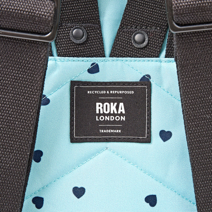 ROKA Bags Canfield Roll Top Backpack in Heart Print