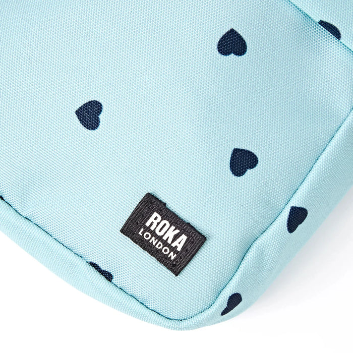ROKA Bond Pocket Crossbody Bag in Heart Print