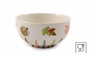 An off-white ceramic bowl decorated with hand-painted autumn motifs including acorns, leaves, and stems in muted green, brown, orange, and pink, shown on a plain white background with a small glassware icon in the bottom right corner.