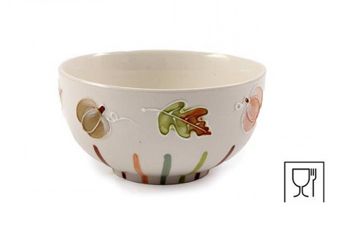 An off-white ceramic bowl decorated with hand-painted autumn motifs including acorns, leaves, and stems in muted green, brown, orange, and pink, shown on a plain white background with a small glassware icon in the bottom right corner.